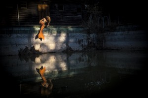mermaid at abandoned pool